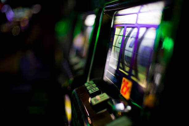 Live Sic Bo dealer shaking dice at zeus slots table